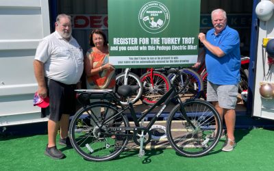 Pedego Bike Donation | 30th Annual Turkey Trot